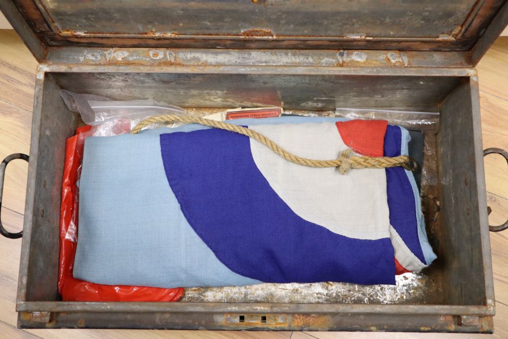 An RAF ensign flag, probably WWII and an Air Ministry metal trunk dated 1943